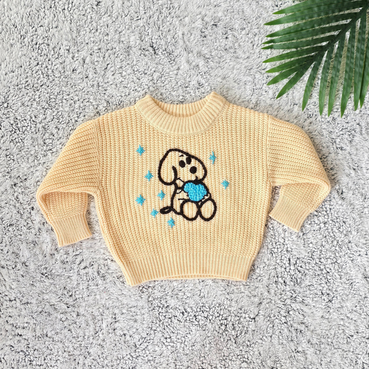 Knitted sweater for baby boy with embroidered dog